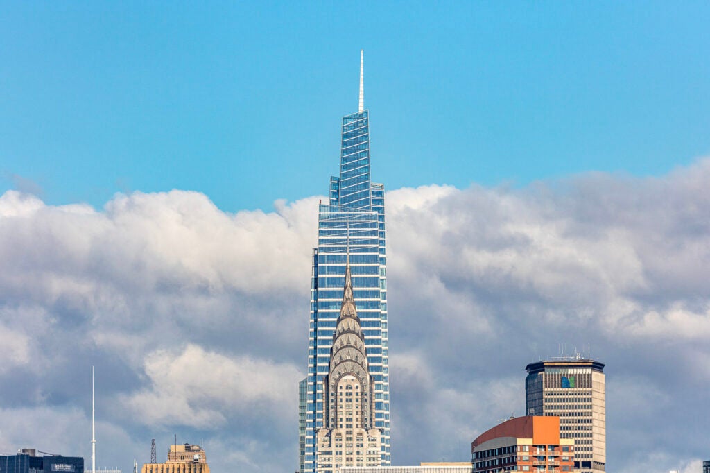 The Chrysler Building, an Art Deco icon, boasts a distinctive spire and intricate design details.