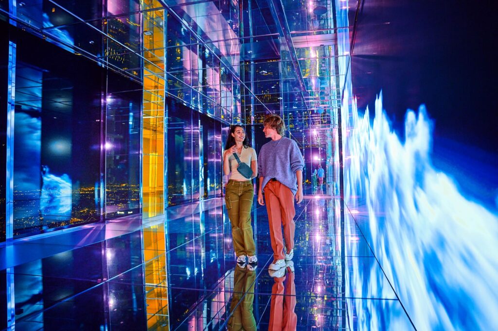Couple in Unity walking along mirrored floor
